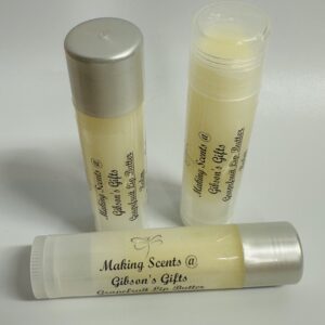 Three tubes of handmade lip balm labeled "Making Scents" with different scents.